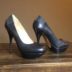 L.A.M.B. size 7 black leather stiletto heels.